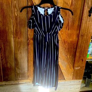 Black and white striped one piece capri romper. Great condition